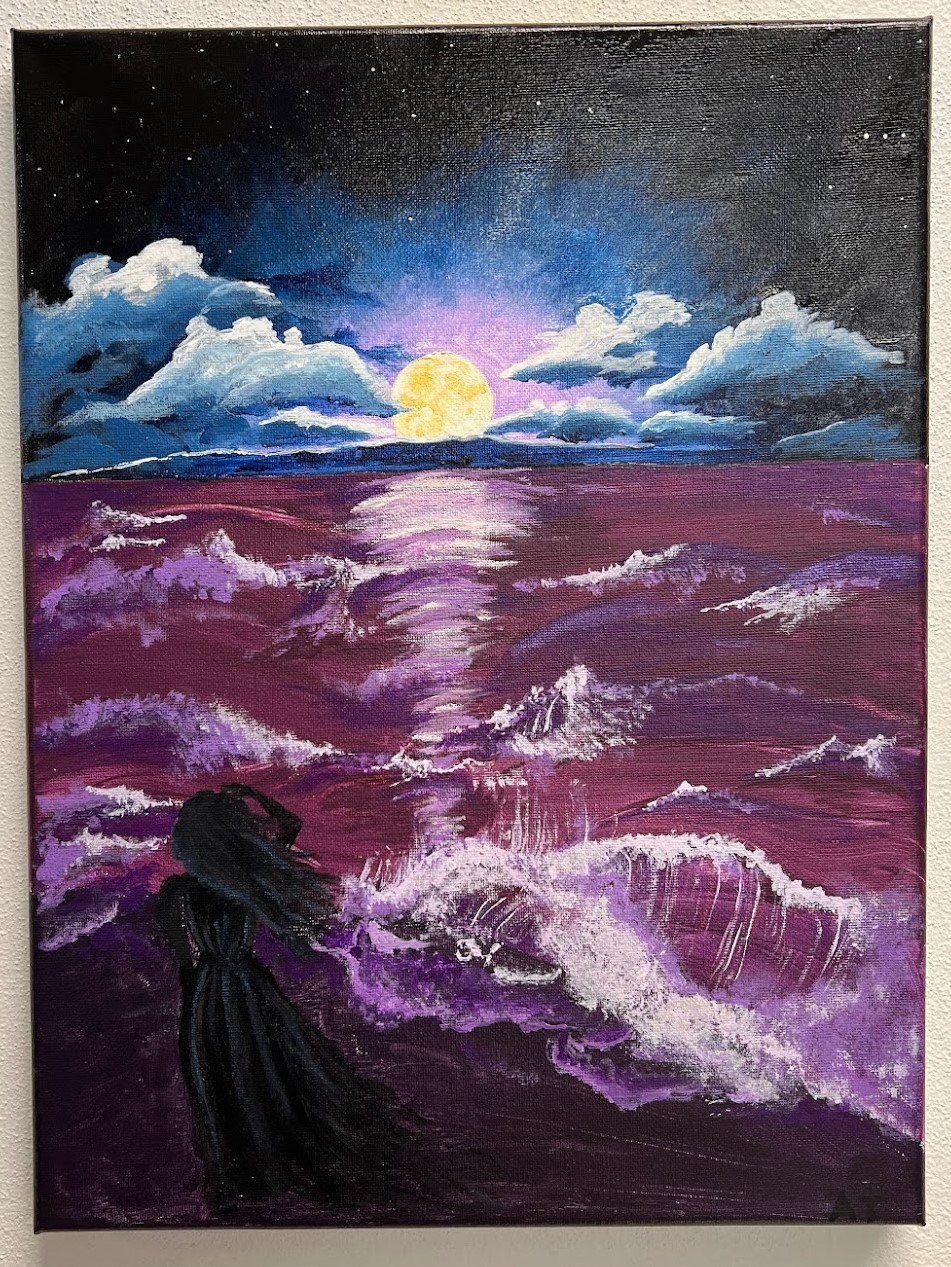 the wistful wanderer, a woman shrouded in shadows stands in the dark purple sand overlooking the ocean. The waves a rich purple with hints of deep burgundy. In the distance the full moon rises in the center through deep blue and white clouds causing the star filled night sky to glow lavender.