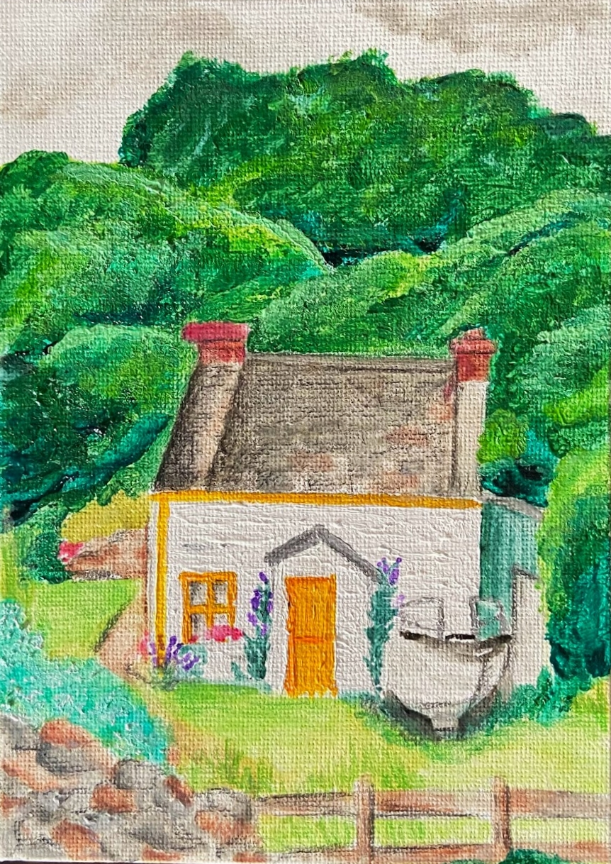A small white cottage with a vibrant yellow door positioned in the Irish countryside. The property sits on the edge of a lush green forest. Much of the gardens and grass is overgrown around the cottage. A boat sits on a concrete block on the right side of the cottage, a green shed attached to the house behind it. A cobblestone wall and a wooden fence wrap around the front edge of the frame.